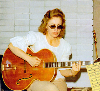 Kaye with her Emperor guitar