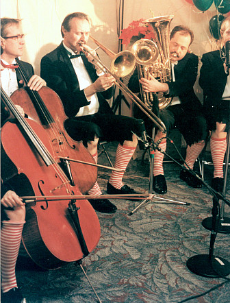 Members of the Seattle Symphony Orchestra in the Christmas spirit for a Twisted Tunes session.