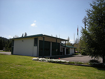 Ravensdale Fire Station, c 2009<br>Photo: <a href="https://commons.wikimedia.org/wiki/File:Ravensdale,_Washington_fire_station.jpg">Joe Mabel</a>, <a href="http://creativecommons.org/licenses/by-sa/3.0/">CC BY-SA 3.0</a>, via Wikimedia Commons