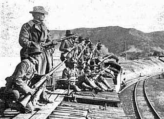 Members of the Colorado National Guard entering the area